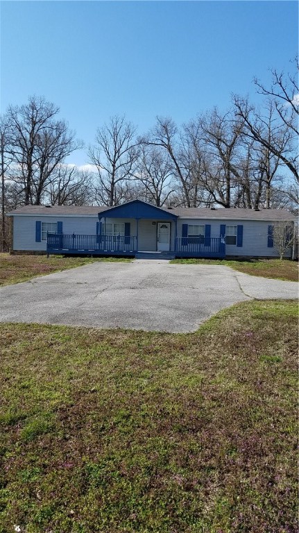 Lease $900.00 Deposit $900.00 Large 3bedroom 2 bath double wide. Large kitchen, dinning room and living room. Fireplace and even a sunroom. Sitting on over 4 acres with a garage/workshop. Beautiful country views. Pets negotiable with a $500.00 refundable pet deposit. All applicants 18 and over, $35.00 credit/criminal history fee.