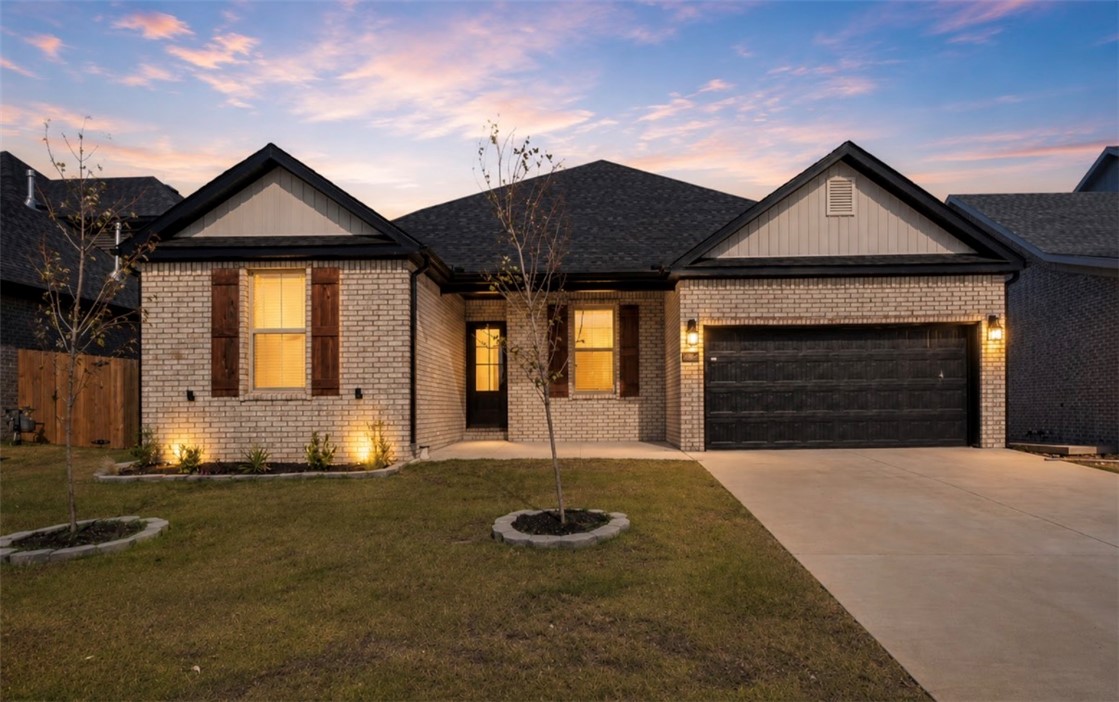 Welcome to Walnut Grove Estates, where modern comfort meets everyday convenience! This beautifully crafted 3-bedroom, 2-bath home offers 1,784 sq. ft. of thoughtfully designed living space with upscale finishes throughout. The open-concept floor plan features custom cabinetry, quartz countertops, a spacious island, and an inviting eat-in kitchen—perfect for gathering with family and friends. Escape to the luxurious primary suite with a spa-inspired bath, oversized walk-in closet, soaking tub, and custom tile shower. Enjoy the peace of a new community just minutes from Vaughn Elementary, XNA Airport, shopping, dining, and everything Bentonville has to offer. The fenced backyard, gutters, and quality craftsmanship make this home truly move-in ready. Future neighborhood amenities, including a pool, add even more value to this exceptional opportunity!
Seller offering $5,000 in closing costs, rate buy-down or appliance upgrade. Preferred lender will waive appraisal and underwriting/processing fee for qualified buyers.