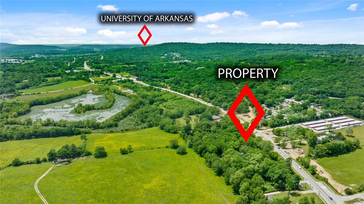 Prime Redevelopment Opportunity on E Huntsville Rd – 1.71 Acres with High Visibility!

Rental property on site brings in $700 a month. 

Located on one of Fayetteville’s key thoroughfares, this 1.71-acre parcel at 3539 E Huntsville Rd offers an exceptional opportunity for commercial redevelopment. With excellent road frontage and strong visibility, the property is ideally positioned near thriving businesses, high-traffic intersections, and growing neighborhoods.



Currently zoned residential, this land sits in the heart of a rapidly transitioning corridor with commercial developments all around—making a rezoning to commercial highly attainable. Whether you’re looking to establish an office space, or mixed-use development, this property delivers the location and layout to support long-term success.