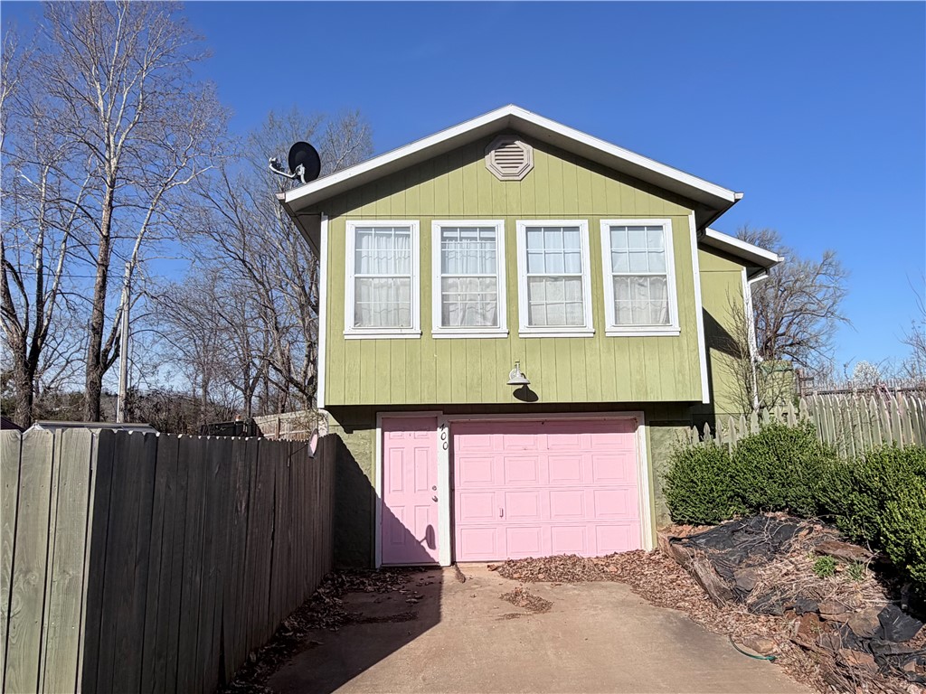 This charming home is within walking distance of the town square and a variety of local restaurants, shops, and grocery stores. .The property features a comfortable floor plan with a spacious living area and a large primary bedroom that includes a generous walk-in closet.
The front room can serve as an additional bedroom and includes an armoire that will remain with the home. There is also a small office space, perfect for working from home or a hobby room.
The kitchen is equipped with a gas stove and a newer refrigerator, both of which will stay with the property. The washer and dryer are also included.
Outside, you'll find a newer storage shed and a small greenhouse in the backyard. The yard is beautifully landscaped with perennial flowers and hostas, creating a lovely outdoor space to enjoy throughout the seasons.
The property qualifies for two zero down programs
Conveniently located, the home offers an easy 30-minute commute to the Northwest Arkansas metro area.