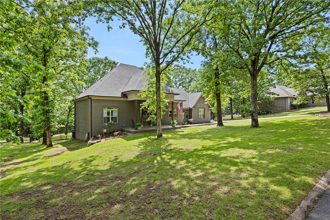 Welcome to this stunning 3-bedroom, 3-bath home nestled on 1.1 acres in the desirable Rosemary Estates. From the moment you step inside, you’ll be captivated by the soaring 12-foot tongue-and-groove wood ceilings and rich oak hardwood flooring that flow throughout the main living area, creating a warm yet elegant atmosphere. The kitchen is a true showstopper, featuring gorgeous quartzite countertops and a copper farmhouse sink. The spacious master suite offers cathedral ceilings and an adjoining flex space ideal for a private office. The luxurious en-suite bath includes a large walk-in tiled shower. Step outside to enjoy the peaceful, oversized back deck overlooking the backyard. Downstairs, you’ll find an additional 600 sq ft flex room complete with its own full bathroom. This home is packed with thoughtful features, including a full walk-through attic, a French drain system, a fully guttered roof with leaf guards, and a 2-car garage with attached breezeway.