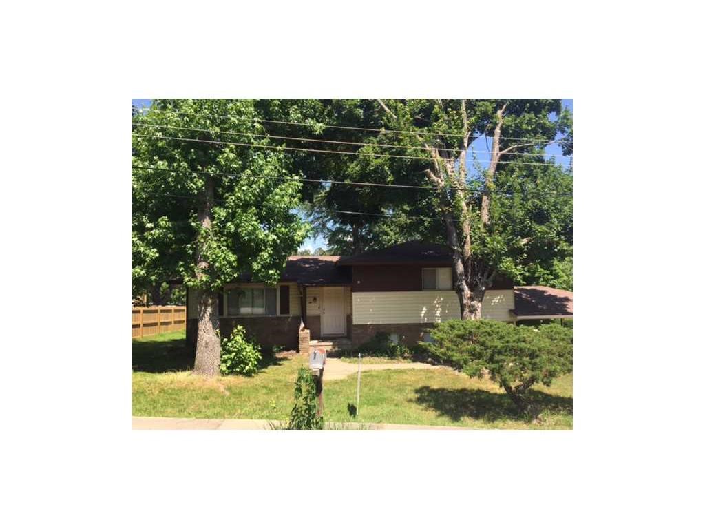 Four bedroom home with bonus room. Quiet neighborhood in the middle of town. Call today for a showing