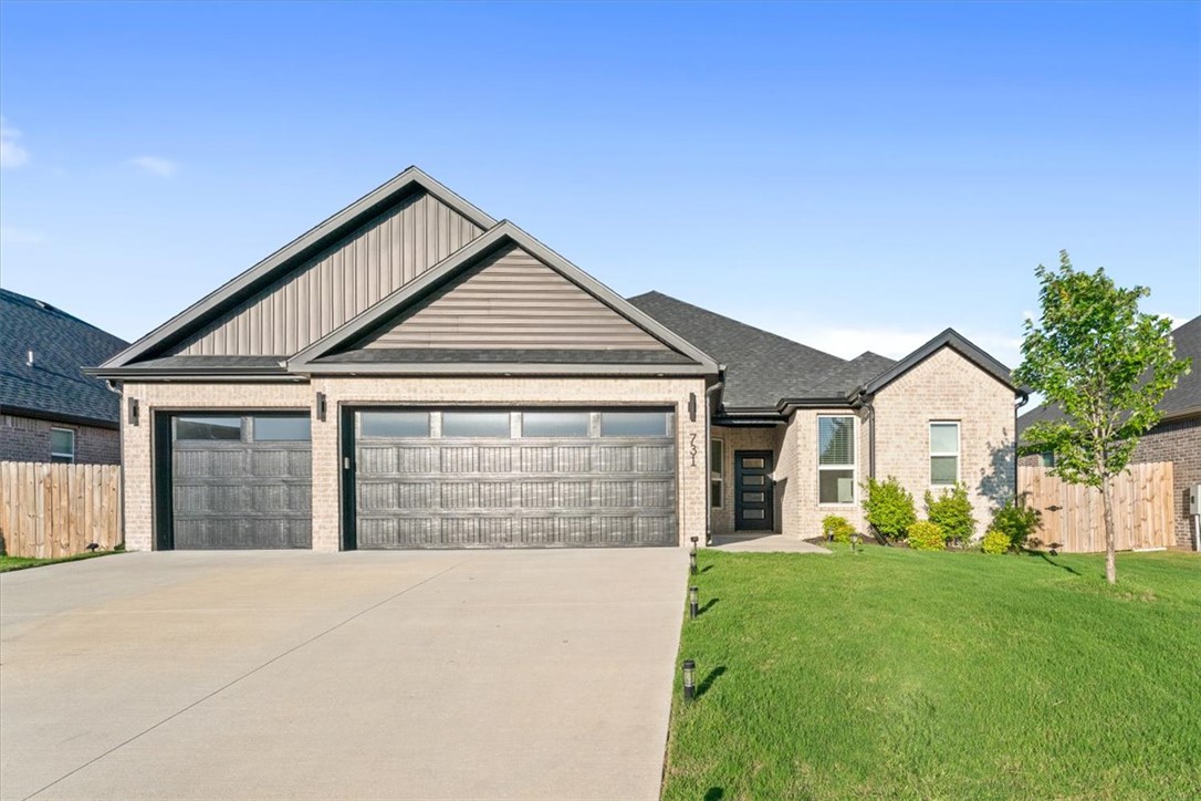 Welcome to Edgewood Estates, one of the newest and most desirable communities in the Bentonville! This beautifully maintained, nearly new "Ruby" floor plan combines modern design, abundant natural light, and everyday functionality. The open-concept living area features a vaulted and beamed ceiling, cozy fireplace, and sun-filled spaces that create a warm, inviting atmosphere. The chef-inspired kitchen offers custom cabinetry, 3CM granite countertops, bar seating, and a spacious dining area perfect for entertaining. The private primary suite includes dual vanities, a soaking tub, tiled walk-in shower, and a convenient walk-through closet connecting directly to the laundry room. A versatile 4th bedroom provides flexibility for a home office, bonus room, or guest space. Rarely found in this price range, the spacious 3-car garage offers ample room for vehicles, storage, and hobbies. Conveniently located near shopping, dining, schools, and XNA Airport. Homes like this don't last long—schedule your private showing today!