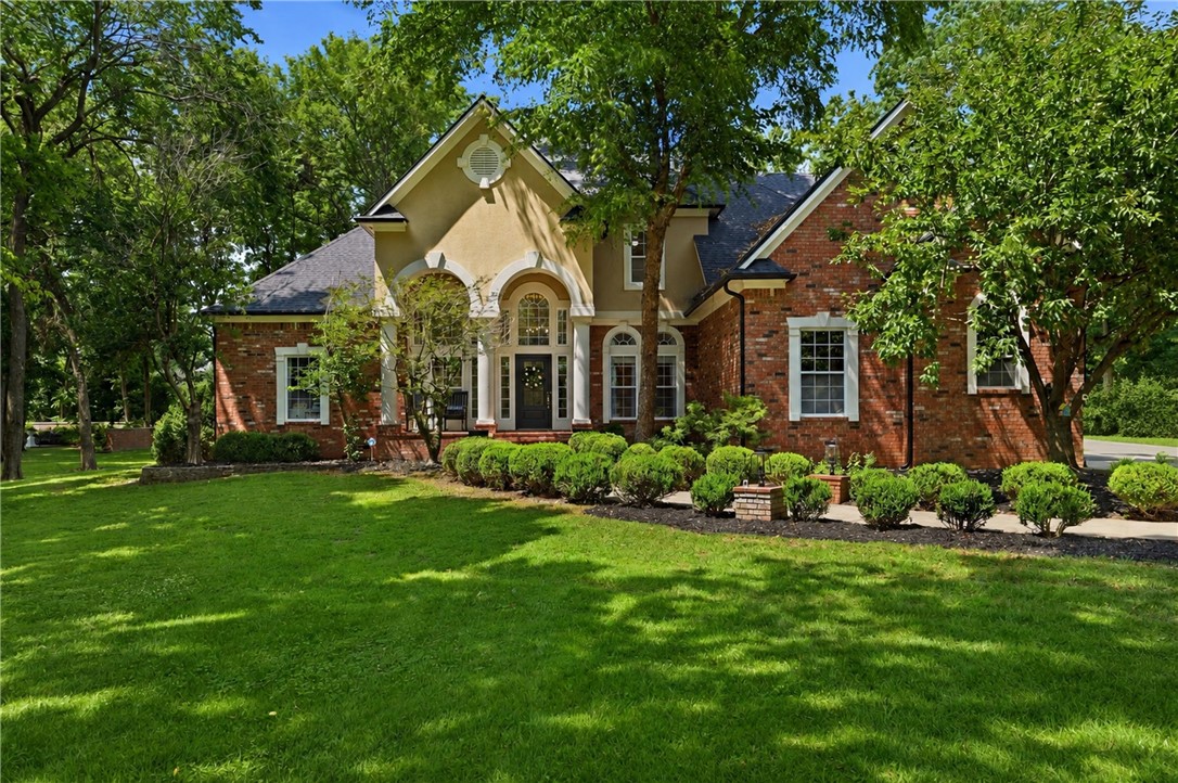 Stunning all-brick estate offering over 4,000 square feet of beautifully designed living space on 2 levels. Tucked away on a quiet private street with a cul-de-sac, this home perfectly balances peace & privacy with incredible proximity to the vibrant, growing heart of Siloam Springs and John Brown University. The main level serves as the hub of the home, featuring two distinct living areas that provide plenty of room for both lively entertaining & quiet family evenings. Upstairs, the home transitions into an entertainment haven, complete with billiard room featuring its own wet bar, a dedicated bonus media room perfect for movie nights, and a flexible space ideal for a home office or personal exercise room. Practicality matches the luxury here, with an attached 3-car garage& an abundance of smart storage solutions throughout. This property offers the space you need, the amenities you want, and the premier location you've been searching for.