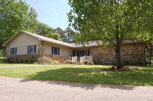 Looking for privacy but still close to town? Enjoy the 2.5 acres of land as you look out or entertain from your oversized deck out back. Interior has been updated with features including bamboo flooring throughout main floor, remodeled kitchen with tons of storage as well as updated bathrooms. Downstairs features 1500 sq ft of bonus space with 2 more additional rooms and more storage! If you are