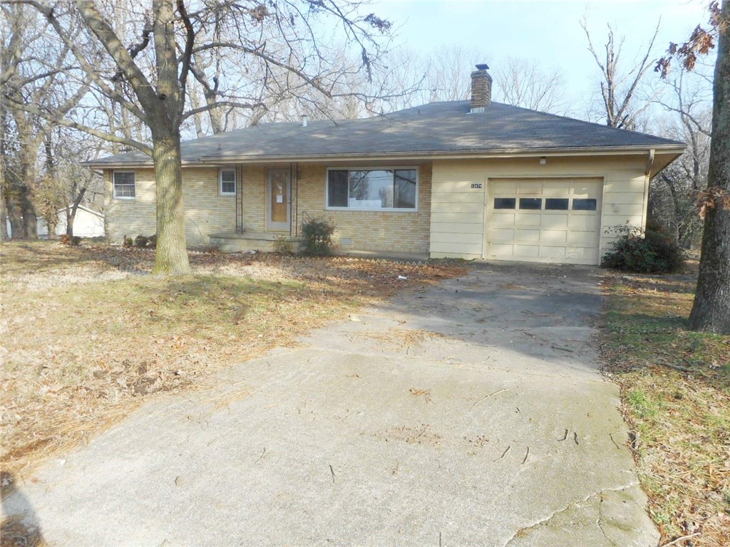 Room to roam!  Spread out on these 2.63 acres with a 1404+ sq ft home, 670 sq ft detached shop building and 80 sq ft storage building.  Beautiful hardwood floors, large laundry room, wood-burning fireplace.  Eligible for FHA 203b financing with repair escrow, sold as-is.