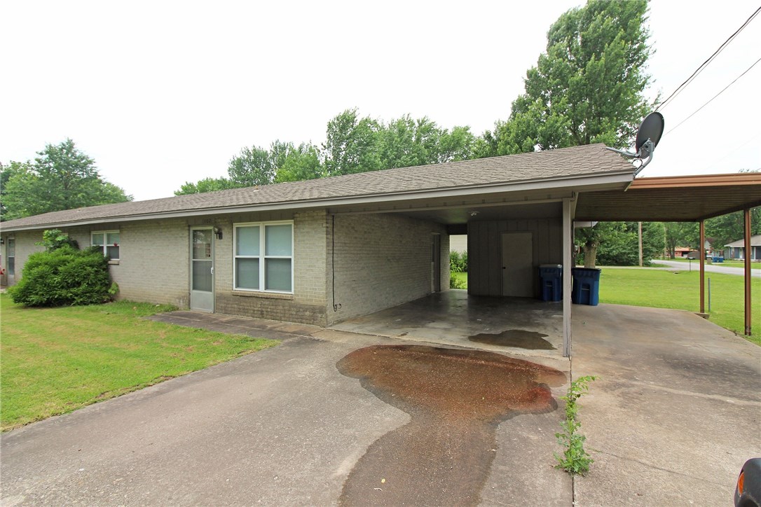 Cute & super location 2 bedroom 1 bath home. All new paint and carpet. 1 car carport. Walking distance to trails, local eateries and downtown Bentonville.