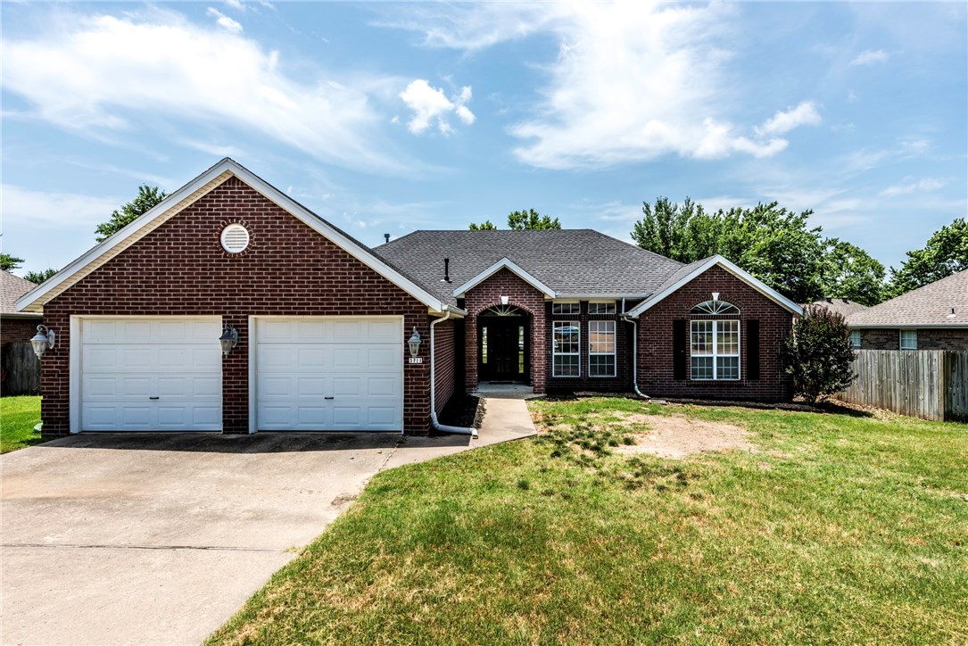 Hurry & See this 3BD/2BA home on .23 acre landscaped lot featuring a spacious Living Room with wood laminate floors & Gas Log fireplace, tiled Eat-In Kitchen with abundant cabinetry & backsplash, office with built-ins adjacent to Living Room; could be formal dining, large Master Bedroom with tray ceilings & wood laminate throughout, His&Her sinks in Master Bath, walk-in shower & WP tub, additional spacious bedrooms, natural light throughout home, large back deck overlooking level privacy fenced backyard.
