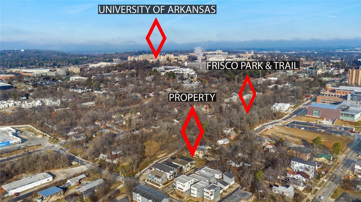 Flat & Level Lot, Development Potential, Backs up to Fayetteville Trail, Two blocks off S School/ Downtown General Zoning, Minutes from Fayetteville Square, University of Arkansas, and Dickson Street.