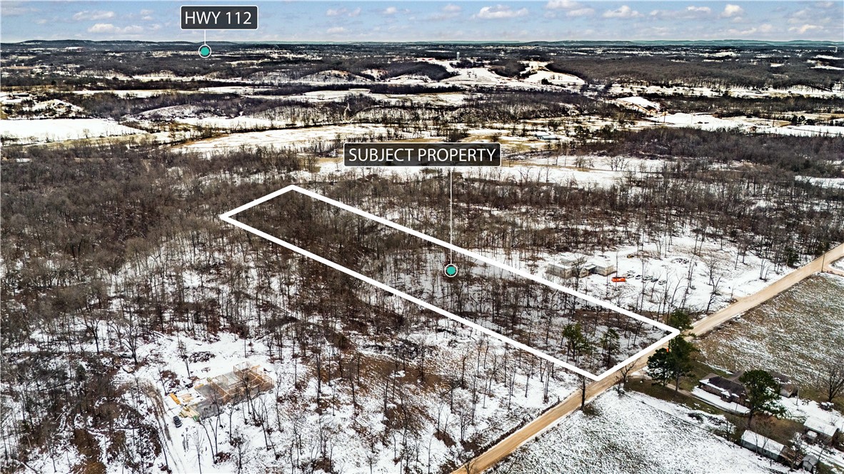 Located in the highly desirable Bentonville School District, this estate-sized lot is the perfect canvas for your dream home. With 2 completed perc test and essential utilities—water, electricity, and fiber—already available at the road, this property offers a smooth and efficient start to your home-building process. Located in the heart of Northwest Arkansas, you’ll be just minutes from Downtown Bentonville, the Walmart AMP, and the Promenade, plus enjoy easy access to XNA Airport and the upcoming XNA Bypass, making travel throughout the region a breeze. Surrounded by mature hardwood trees, this lot provides a peaceful, private setting while also offering great investment potential as the NWA area continues to grow.