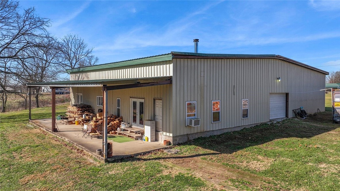 Set just outside of town, this spacious bardominium offers quiet, convenient country living with room to build, work, or spread out. The large shop and comfortable living space give you a solid foundation to make your own. Whether you are looking for a home base, a place to run a small trade business, or just a property with plenty of flexibility, this is it. With paved road frontage and easy access back to town, it's the kind of setup that keeps life simple while still giving you all the space you need. Peaceful setting, practical layout, and a shop that's ready for whatever you have planned-this one fits a wide range of uses and lifestyles.
