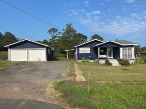 Remodeled Cottage!This home has had a complete face lift and is move in ready.  It offers 3 bedrooms, a beautiful master bath with a huge walk-in shower, there is a view of Lake Dardanelle from the front porch and it's close to Mt Nebo State Park as well as the Marina and Lion's Den Golf Course.  A 2nd bathroom has been started and can either be finished or the room can be converted into a home office/study.  A new roof was installed in Dec 2020 on the home, garage, & outbuilding that has a 3 yr warranty.This home is currently operating as an Airbnb and VRBO since mid June.  Selling ''As Is, Where Is''