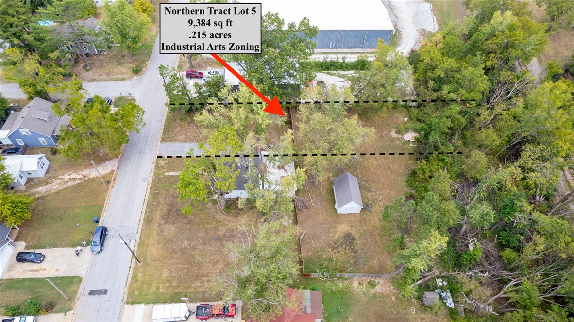 Incredible Zoning!! Industrial Arts/Town Center Low (T5.1) under the new code. Build your dream office space, industrial flex or a variety of other mixed single and multi-family options- its endless. Lot 5 is the most northern of the 3 lots available. Each lot is 50' wide (front and back) and this one is 194' and 184' deep on each side. There is currently fencing around the property but can be removed, if desired. See MLS #1331174 for listing with all 3 lots. Lot 6 is MLS #1335110 and Lot 7 is MLS #1335111.