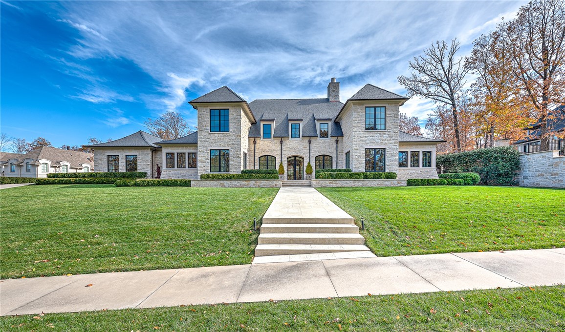 One of a kind, stunning Custom Built 6800+/- sq ft Estate Home built by Preston & Company, situated on large 0.73 acre lot in the gated Clear Creek subdivision on hole Number 9 of the Blessings Golf Course. This home has every upgrade you can imagine with curated fixtures and flooring throughout.  Antique reclaimed limestone floors imported from Italy; outdoor fireplace w 16th century original antique limestone hearth and surround; interior fireplace with custom carved limestone mantle from NY; French Oak wood flooring; reclaimed terra cotta flooring from France in laundry; Kolbe windows and exterior doors; reclaimed wood beams from Colorado; custom quarter sawn French Oak cabinets and doors; antique light fixtures throughout most of the home; tiled pool and hot tub; steam shower; smart home upgrades; generator; water softener and reverse osmosis.  You will not find another home with this level of fixtures and amenities.  Make an appointment to see it in person to appreciate the exquisite craftsmanship!