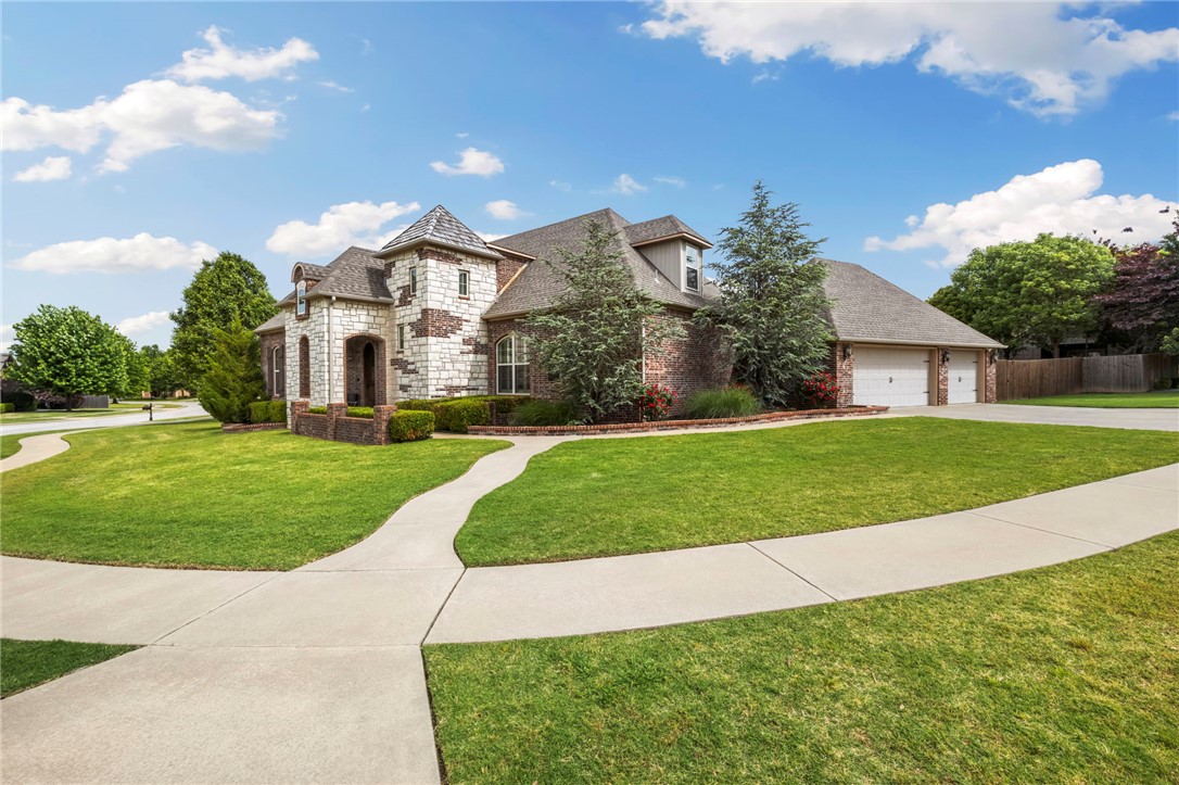 Tucked into a beautifully landscaped corner lot, this 4 bed 3 bath Fayetteville home blends elevated design with warm, inviting living spaces filled with natural light. Wood beam accents, custom plantation shutters, and thoughtful finishes give the home a timeless feel with just the right amount of character. Heated floors throughout the downstairs add everyday comfort, while the seamless layout opens effortlessly to a covered outdoor retreat complete with a fireplace, built in grill, and pizza oven that make entertaining feel easy year-round. The large yard offers plenty of room to relax, play, or gather with friends and family. The fully equipped media room is ready for relaxed nights at home, and every space reflects the level of care and maintenance poured into the home over the years.