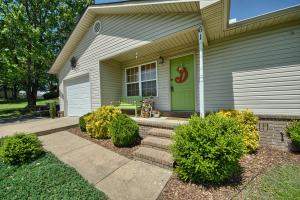 Extras, Extras, Extras! There is no lack of personality in this 3 bed 2 bath charmer sitting on .9 fully fenced acres. Plenty of room for playtime and entertaining on the large back deck and huge yard, in a quiet private cul de sac. Beautiful Wainscoting in the living area, gorgeous maple hardwoods, built in banquet and table and unique shelving for display. Large closets & oversized laundry room
