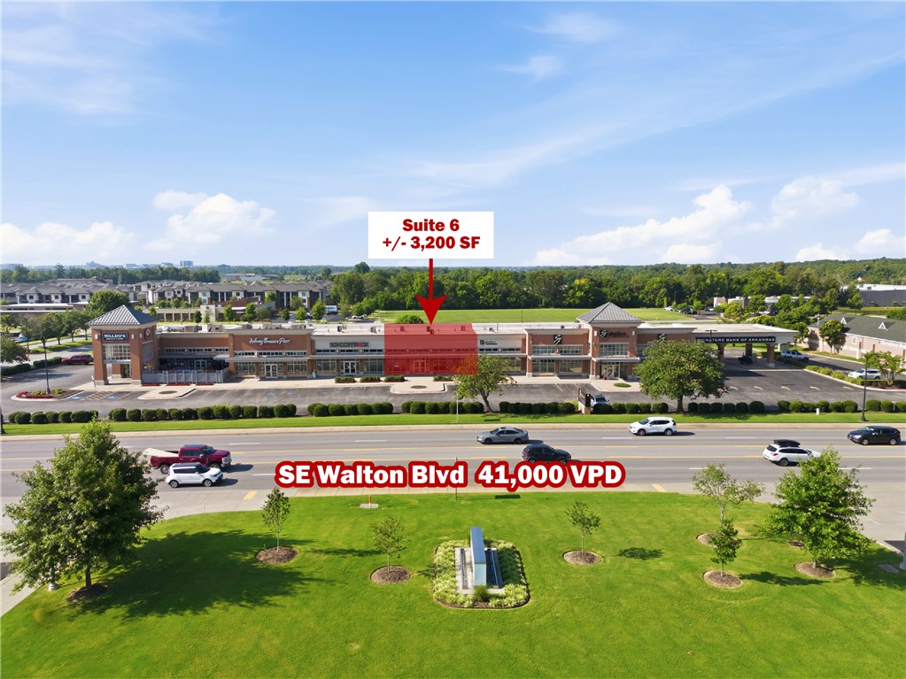 Exceptional +/- 3,200 SF space available along SE Walton Blvd with exposure to approx. 41,000 VPD. Previously occupied by a salon, the space is fully built out and ready for another salon, spa, beauty, wellness, or retail concept. The interior features a modern, upscale design with beautiful flooring, elegant chandelier lighting, welcoming reception area with built-in product display shelving, mirrors and electrical connections for up to 16 styling stations, two restrooms, a breakroom with kitchenette, storage closets, and four private rooms that can be used for spa services, offices, or treatment rooms, with two featuring sinks. Located in Signature Plaza alongside Signature Bank, School of Rock, Waldo's Chicken & Beer, and Johnny Brusco's Pizza, and surrounded by popular businesses including First Watch, Crumbl, Jimmy John's, 7 Brew Coffee, Starbucks, and more, creating a vibrant commercial corridor with consistent traffic and excellent visibility.