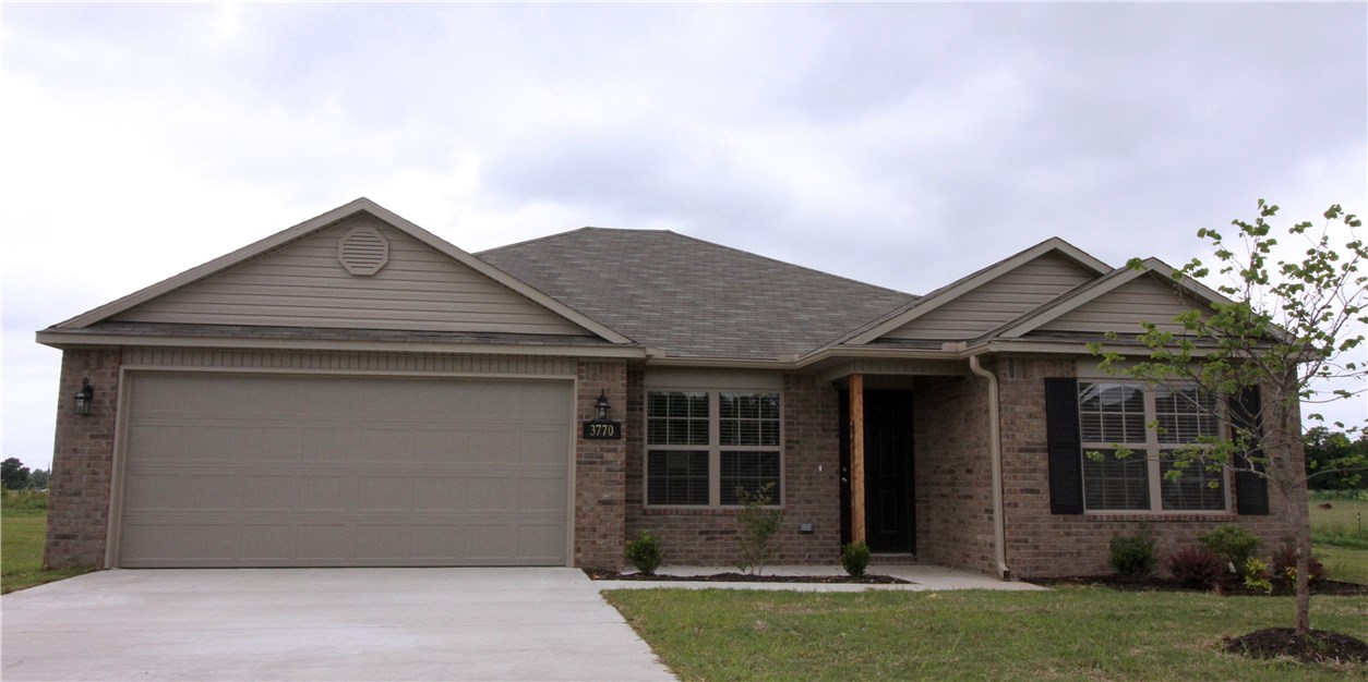 This brand new 1,467 square-foot, 4 bedroom, 2 bath home has easy-to-care-for hard-surface flooring throughout. (No carpet!) All electric house with washer/dryer hookups and a living room (w/ vaulted ceiling) that leads into a roomy, eat-in kitchen.

Convenient to JB Hunt, Tyson, Lowell, and downtown Springdale, and mid-way between Bentonville and Fayetteville.

Check out all of the 3 and 4 bedrooms available for rent in this neighborhood.
For the month of June only, ask about our Move-In Special!