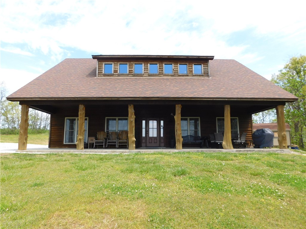 Awesome views from this 3BR 3BATH cedar cabin, constructed in 2015, located just a short distance from Ponca, Arkansas in the Upper Buffalo National River area of Newton County. Open concept design, constructed on a concrete slab with beautiful tile flooring throughout. Other features of the home include granite counter tops, custom cabinets, double kitchen ovens, good internet speed, security system, two hot water heaters, dual zoned HVAC, abundance of closet & attic storage, & high end furnishing & decor that convey with the sale of the home. Features outside include full length cover front porch, landscaped firepit & setting area, 500 gal owned propane tank, large storage shed/workshop & RV hook ups with both 30/50 amp connections. Outstanding past nightly rental history. Only 5.6 miles from the Compton Trailhead (Hemmed-In Hollow), 1.5 miles to Centerpoint Trailhead, 7 miles from Lost Valley Trail & only 5.5 miles from the Ponca Canoeing Access of the Buffalo National River in beautiful Newton County AR.