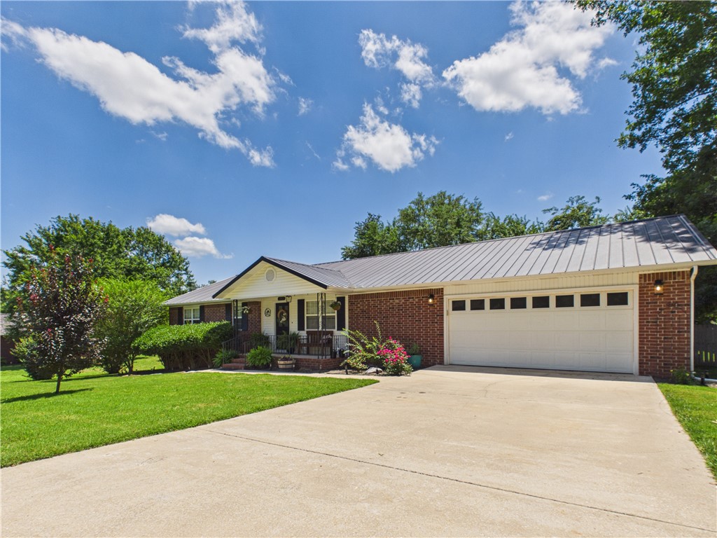Welcome to 1302 W. Rogers Avenue, where comfort, convenience, and recent updates come together to create the perfect place to call home. This inviting 3-bedroom, 2-bath home offers a functional floor plan with comfortable living spaces designed for everyday living. Recent updates give the home a fresh, modern feel while maintaining its warmth and character. Step outside to enjoy the wonderful privacy-fenced backyard—an ideal space for relaxing, entertaining friends and family, gardening, or letting kids and pets play safely. Conveniently located close to schools, shopping, restaurants, and other amenities, this home offers the perfect combination of a great location and move-in-ready condition. Whether you're a first-time homebuyer, looking to downsize, or simply searching for your next home, this property is one you won't want to miss! Schedule your showing today and see everything this wonderful home has to offer!