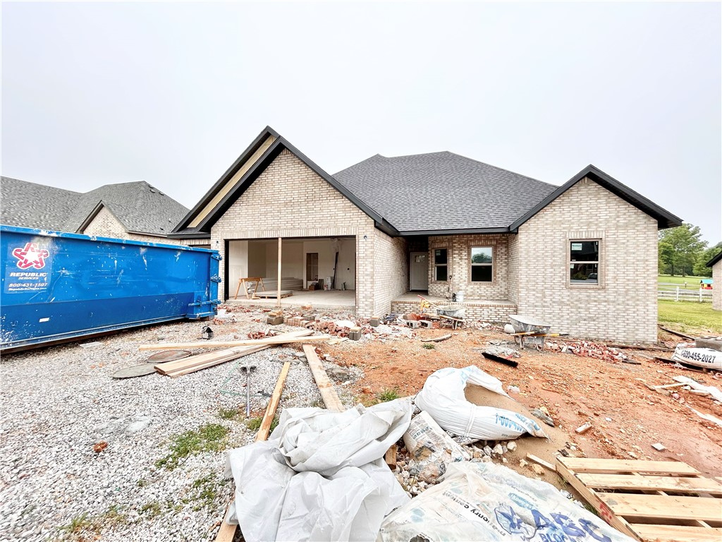 TO BE BUILT. Perfect time for you to pick out finishes! Discover the "Cambridge" plan, ideally situated close to the Pea Ridge High School and trails! Just 15 minutes from the new Walmart Campus! This beautiful home features 4 spacious bedrooms / 2.5 baths and a split floor plan. Enjoy the flexibility of a 3-car garage and the elegance of custom cabinets throughout. The kitchen includes a gas range and a huge island perfect for gatherings. Step out to the covered patio for outdoor relaxation and entertaining. $5,000 in buyer's closing costs from the builder's preferred lender. Schedule your showing today!
