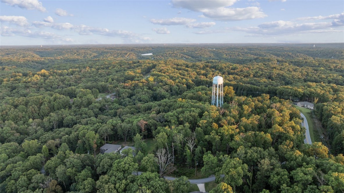 Great location! This property spans .38 acres and is located in the Bentonville school district. A septic system is required for this property.
