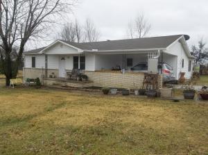Updated home on 1 acre m/l on paved road with new central heat & air, new roof in 2011, large pantry, large utility, 2 linen closets, handicap accessible shower, 10'x15' & 12'x20' sheds in Bergman School District, near level lot. All #'s are approx., age is an estimate, sq footage per assessors card. Old well not in use.