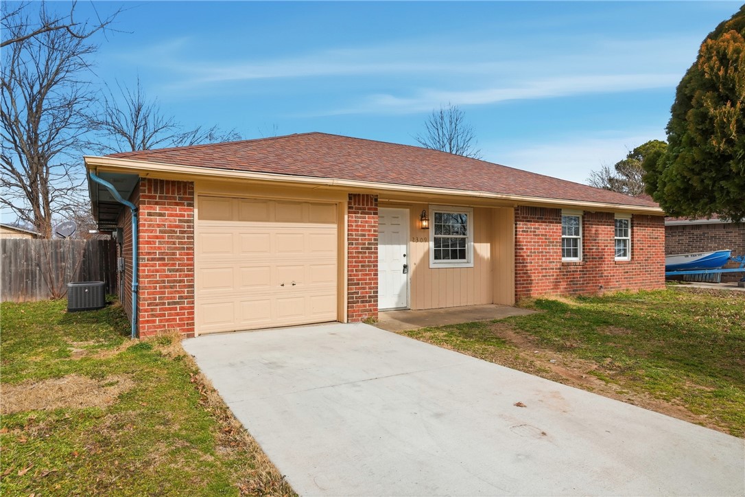 Welcome to this ±1,300 sq ft home in Rogers, offering 3 bedrooms, 1 bathroom, and a 1-car garage—perfect for comfortable everyday living. Step inside to find no carpet anywhere, with beautiful wood flooring and ceramic tile throughout for easy maintenance and a clean, modern feel. Enjoy outdoor living in the fully fenced backyard, complete with a covered back porch—ideal for relaxing, entertaining, or enjoying quiet evenings at home. The primary bedroom features a spacious closet, and additional storage closets provide plenty of room to stay organized. This home comes fully equipped with a washer, dryer, stove, and refrigerator, making it truly move-in ready. Conveniently located less than a mile from N Dixieland and W Walnut, making it close to shopping, dining, schools, and local amenities, this property offers both comfort and convenience.