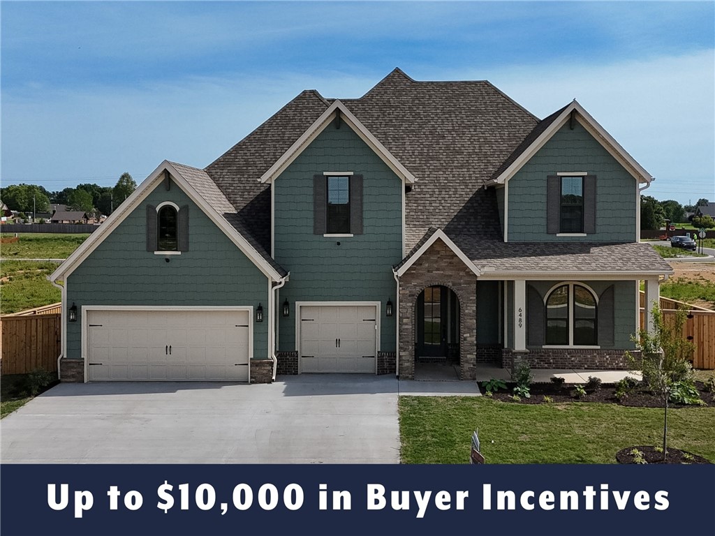Up to $10,000 in buyer incentives available, including $6,500 from the builder and $3,500 from the preferred lender. These incentives may be used toward closing costs, prepaids, or a rate buydown. The builder portion may also be used as an appliance credit. Located in County Line Square near Shaw Family Park. The Dover opens with a bedroom and full bathroom off the entry, then leads into the main living area. A fireplace anchors the space, while large windows overlook the covered back patio and engineered hardwood run throughout the first floor. The kitchen includes a large island, ceiling-height cabinets, GE Profile appliances, and a pantry. The primary suite features a vaulted ceiling, double vanity with centered makeup vanity, walk-in shower, and walk-in closet. A laundry room, mudroom, and 3-car garage are also on the first floor. Upstairs offers 3 bedrooms and a full bathroom. Fence, gutters, and blinds are included, and a community pool and pavilion are coming soon for residents to enjoy.