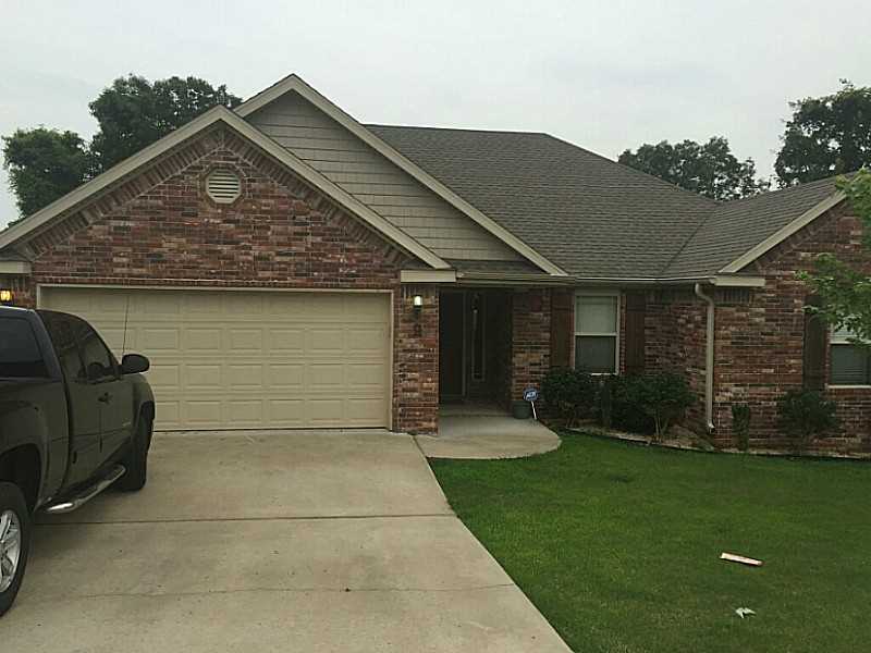 Move right in. Near new home in kid friendly neighborhood. Close to Metfield Golf Course and Rec Center.  Bentonville School,  Level lot. Fully fenced. Split floor plan, tall cathedral ceiling with crown moldings, granite counter tops, upgraded cabinetry.,Already on sewer, covered deck, level driveway, and a big grassy backyard.