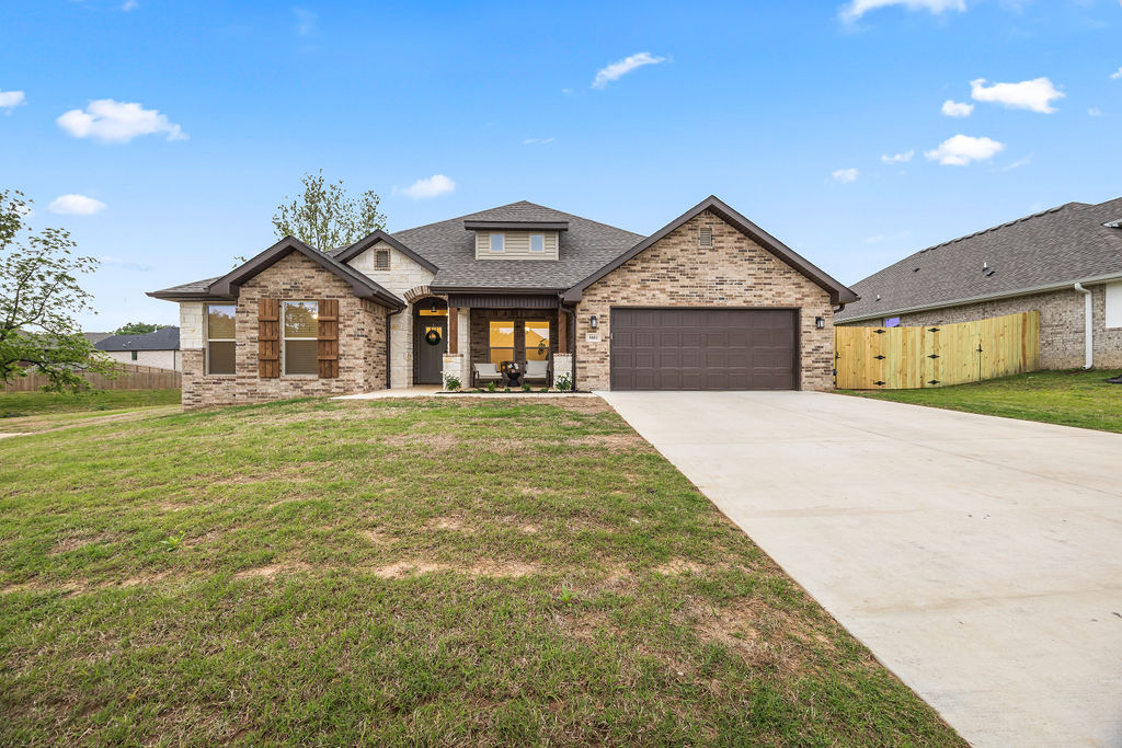 This beautifully newly constructed home offering modern comfort, quality craftsmanship, and a peaceful setting. This spacious home features 4 bedrooms, 3 bathrooms, and 2,654 square feet of thoughtfully designed living space. The open-concept layout creates a seamless flow between the living, dining, and kitchen areas—ideal for both everyday living and entertaining. Enjoy a modern kitchen with stylish finishes, ample cabinetry, and plenty of room to gather.
The home is in excellent, like-new condition and includes a 2-car garage along with additional parking—perfect for guests or extra vehicles. The fully fenced yard offers both privacy and functionality, making it great for pets, outdoor activities, or relaxing evenings. Location is a standout feature, with quick access to I-49 for an easy commute. You’re just minutes from shopping, dining, and everyday conveniences, including Walmart Supercenter and a variety of nearby restaurants.