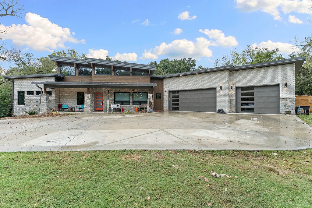 One-of-a-Kind Dream Home in the Heart of Pea Ridge
Discover this stunning home on nearly three private acres, perfectly located within walking distance to schools, shopping, restaurants, and more. Featuring 4 bedrooms and 2.5 baths, this home offers spacious walk-in closets, an oversized laundry room with built-in ironing space, and custom touches throughout including sliding barn doors and custom lighting in most rooms. Enjoy remote-control blinds, large windows that fill each room with natural light, and a unique wall art panel that opens to hidden bar closet. Step outside to your private hilltop retreat complete with an in-ground saltwater pool, fire pits for entertaining, and abundant wildlife. Spiral staircase leads to a versatile bonus room, perfect for a home office/game space. The three-car garage includes extra storage closet, and the circle drive adds convenience and curb appeal. Custom cabinetry designed for small pets. This is truly a rare find—a private, serene escape but still in the heart of town.
