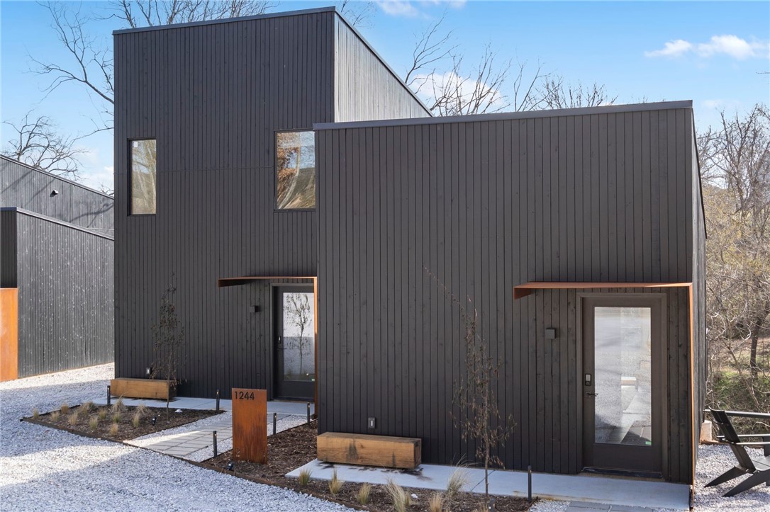 Modern creekside cabins just 1 mile from Bentonville Square! Perfect for investors, corporate buyers, or
young professionals seeking downtown access with the ability to offset cost of living. Each parcel includes
2 dwellings (6 total across 3 lots / 0.58 acres) backing up to Black Apple Creek with waterfall and trail
views. R-2 zoning with new sewer and utilities, shared access drive. Suite 1: 376 SF studio 1 bath. Suite 2: 892 SF 2 bed 1.5 bath. High-end finishes include cedar rainscreen, concrete floors, stainless appliances,
and high-efficiency cassette mini-splits. Buy one parcel or all three at a portfolio discount. Buyer to verify
all details.