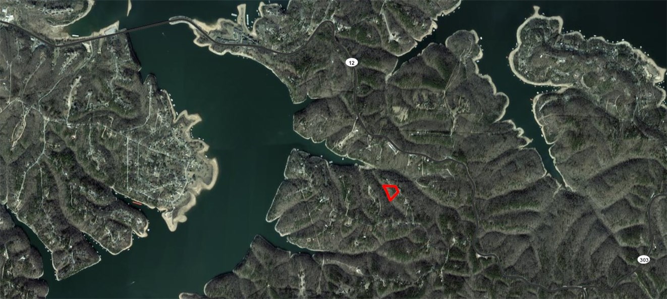 Looking for some privacy with a lake lot ?   Room to spread out in this wooded neighborhood with large lots.  Incredible lake view possible with carefully planned house build and selective tree trimming !  Near Hobbs State Park hiking and biking trails, Hwy. 12, War Eagle Mill,  and yet only 12 minutes to downtown Rogers.   Only a handful of minutes to public boat launch.