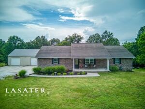 Need a family home in Valley Springs School District? This stunning 4-bedroom, 3-bathroom all-brick home, on 3.44-acres, may just be what you're looking for! Enjoy the open concept of the main level with ample living area designed for both relaxation and entertainment. The beautiful kitchen features custom cabinets with pull outs, granite countertops, and a walk-in pantry. 3 bedrooms and 2 bathrooms are on the main floor. In the expansive basement, we have endless possibilities for a home theater, game room, or a private retreat, including the 4th bedroom and 3rd bathroom. Two of the other rooms can be used as bedrooms, each having a closet but not a window. This spectacular property includes a well-equipped 30X40 shop, perfect for any DIY or outdoor enthusiast, giving you plenty of space
