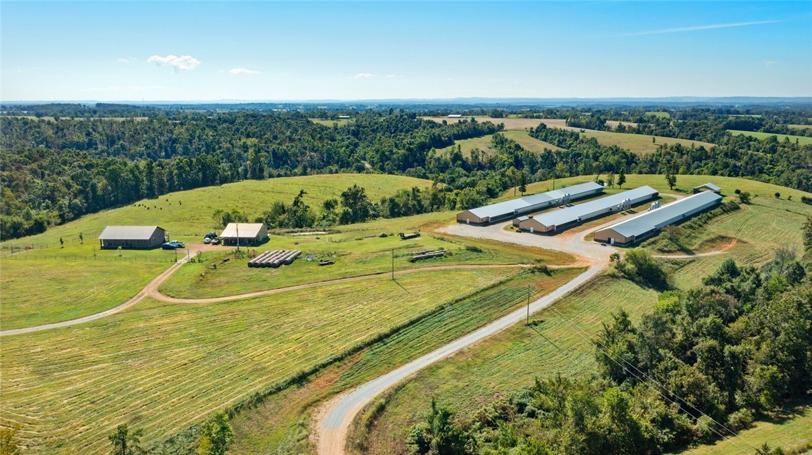 BIO-SECURE - DO NOT ENTER WITHOUT PERMISSION - APPOINTMENT ONLY! This listing includes the residence 3/2 and shop with approximately 23 ac mol, 3 Breeder hen house operation also has a location for a mobile (septic and water in place), the houses are all new (inside) and have a 15-year contract in place! This is a great producing farm, and it is ready for a new owner! Call today! Welcome to the option to live/work at home! Without house listing mls 1318661
1 house is brand new; two others are mostly original with all updates completed. PREMIUM PAY.