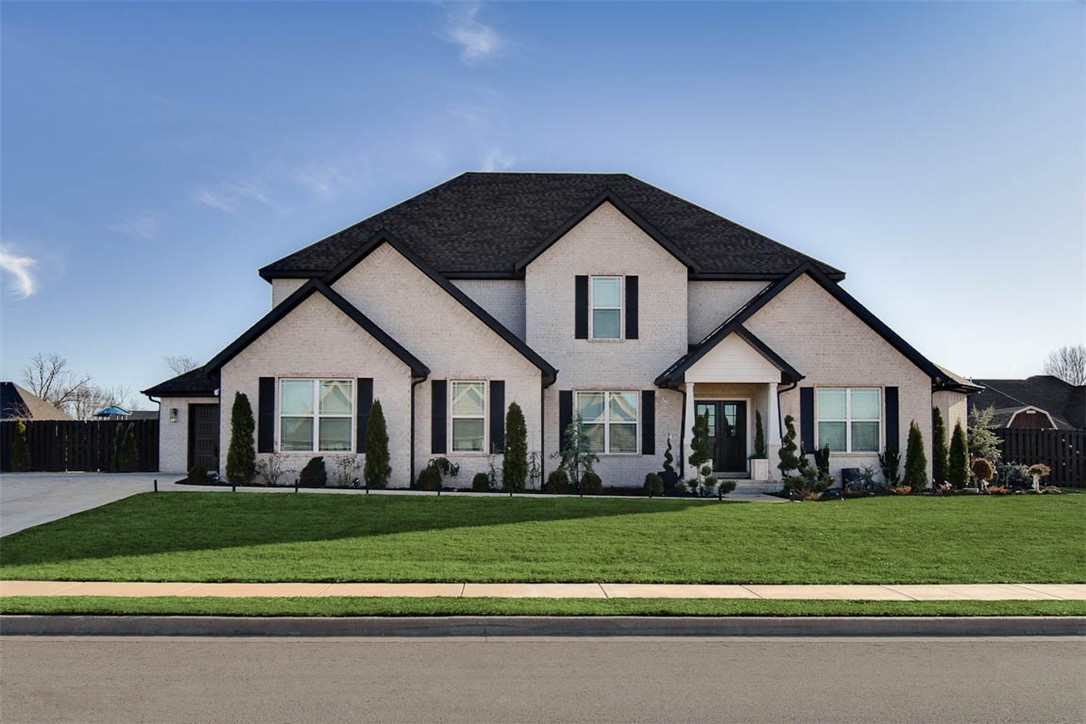 This beautiful home is located in the highly sought-after Elmdale Lake Estates. It will not disappoint! From the moment you step into the 2 story foyer, light open spaces greet you, and an open floor plan is perfect for entertaining. The spacious kitchen with a large walk-in pantry and quartz countertops is every home chef's dream. Open to the great room and a spacious breakfast area, there's also access to the covered patio with a fireplace, perfect for your indoors and out entertaining as one large space to enjoy friends and family. The main floor also features a perfect primary suite with spa-like bath and spacious walk-in closet. Upstairs are 4 more bedrooms - one is ensuite, plus a bonus room. There's also plenty of storage for everyone. Located close to Elmdale Lake known for great fishing, shopping, parks, dining, entertainment, and more. Conv. to the airport, interstate, Many upgrades & custom features that were  added after purchase