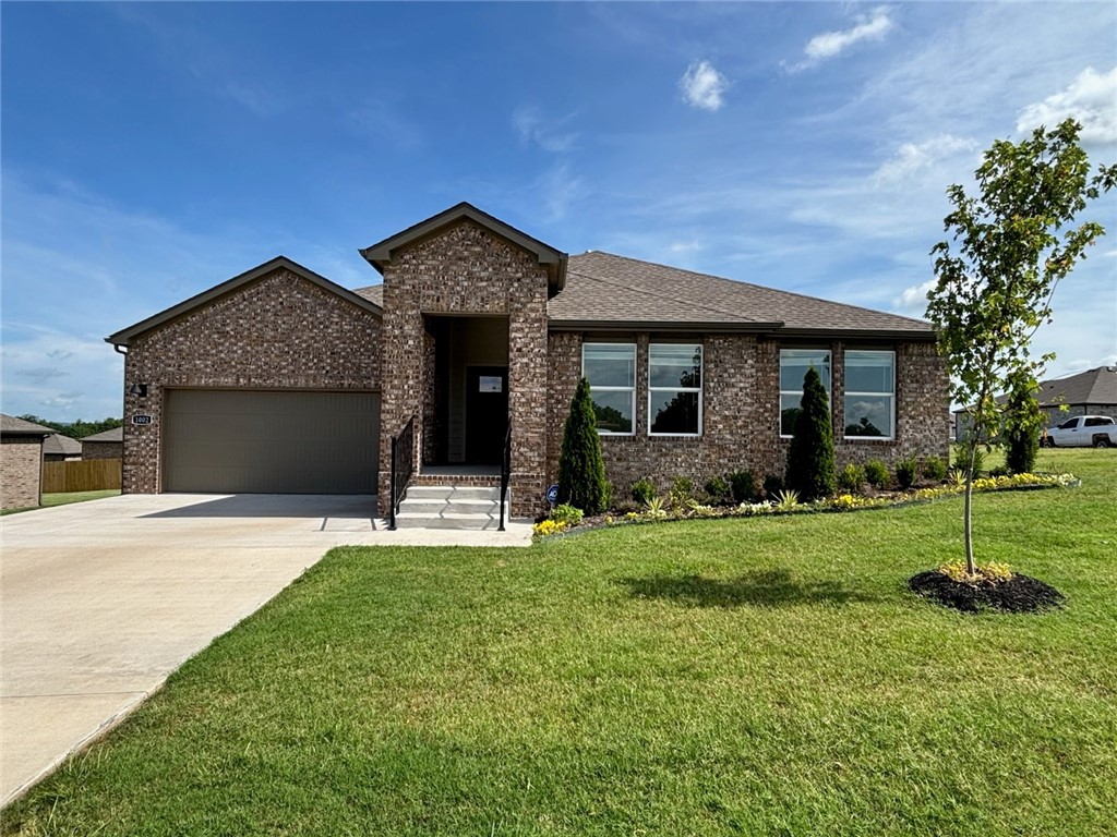 Delightful Dean Plan in Rolling Meadows, in Pea Ridge, Arkansas! Each home in Rolling Meadows is meticulously crafted with attention to detail, creating a space that feels both luxurious and welcoming. From the moment you walk through the door, you'll be greeted by modern features and a spacious layout that caters to every lifestyle. Our homes boast premium finishes and thoughtful designs, ensuring that you'll be stepping inside your own personal oasis. These homes will be complete with LVP flooring throughout (two-story plans will have carpet on stairs and upstairs) and wood shelving in all closets, pantry, and utility room. The kitchen will have quartz kitchen counters, 36-inch cabinets, and stainless-steel appliances with a Gas Range! The primary bath will feature quartz countertops, double sinks, and a walk-in shower. Each home comes with 4-sided brick with Hardie® fascia per plan. Home will have a Garage Door Opener. Taxes and Parcel TBD. Lot sizes are approximate!