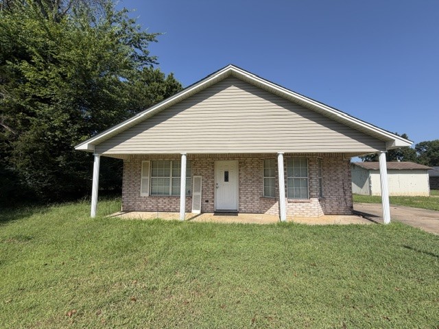 Brick home, 3 bedroom, 2 bath, open living/dining and kitchen.  Concrete drive and parking.