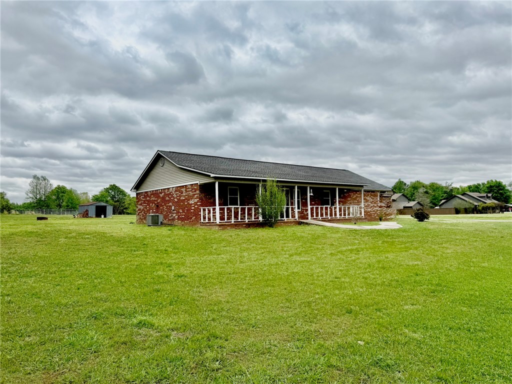 Discover your next chapter in the Arkansas River Valley — located inside Pottsville city limits. This roomy 4-bedroom, 2-bath home offers 1,755 sq ft of comfortable living on a private 1.5-acre lot.

Step inside to bright, open living spaces perfect for family life and entertaining. Four bedrooms provide flexible space for a home office or hobby room, and two full baths make routines easy. Entire home, including the kitchen is wheelchair accessible. Outside, the expansive yard gives you room for gardening, play, or future outbuildings.

Enjoy peaceful, semi-rural living with city convenience: minutes from I-40, within Pottsville schools (High & Junior High), and a short drive to Russellville shopping, dining, and major employers. Ideal for relocating families, commuters, or anyone wanting more space without sacrificing accessibility.

Schedule a showing today and see how this Pottsville River Valley home fits your lifestyle.
