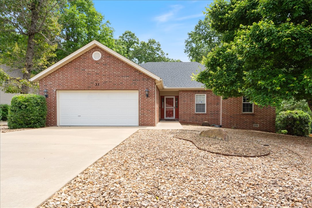 Pre-inspected and meticulously mechanically maintained, this 3/2/2 South Bella Vista home delivers efficiency, flexibility, and peaceful living in one of the area’s most desirable pockets. Featuring geothermal heating & cooling, sewer service, brand new architectural shingle roof (5/26), and 9’ ceilings throughout, this 1,812 SF split-floor-plan home keeps utility bills civilized while life stays comfortable. Dining room easily converts to a 4th bedroom, office, den, or hobby space. Located minutes from Bentonville near Metfield Golf Complex, Blowing Springs Greenway, and the Back 40 trails, this location feels tucked away while keeping everything nearby. Features include wood/tile/carpet flooring, gas log fireplace, walk-in closets, attic storage, eat-in kitchen, brick & vinyl exterior, massive crawlspace storage/workshop potential, and a rear deck offering quiet backwoods-style solitude. Offered with $5,000 flooring/paint allowance WAC. Due diligence package available upon request.