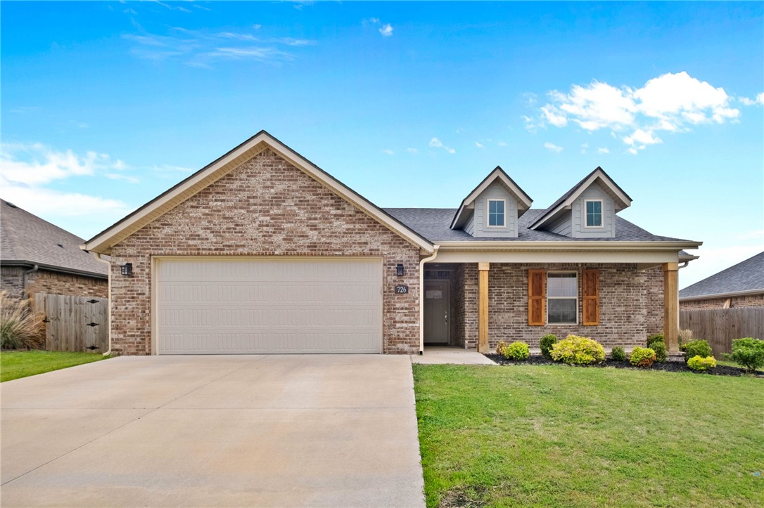 Welcome to Hickory Meadows in Tontitown! This 3-bedroom, 2-bath home offers 1,574 sq. ft. of blended space with an open layout that seamlessly connects the living, dining, and kitchen areas, ideal for both everyday life and entertaining.
The kitchen is a standout, featuring a large island, granite countertops, stainless steel appliances, a pantry, and abundant cabinetry. The living room provides a warm, inviting atmosphere with a cozy gas fireplace as its focal point.
The primary suite is designed for relaxation, complete with a shower, dual vanities, and a spacious walk-in closet. Additional conveniences include a separate laundry room, tankless gas water heater, and a new roof.
Step outside to enjoy the covered back patio, and take advantage of community amenities including a resort style pool, cabana, and playground, perfect for enjoying the neighborhood lifestyle! Quick access to all NWA! Great schools!