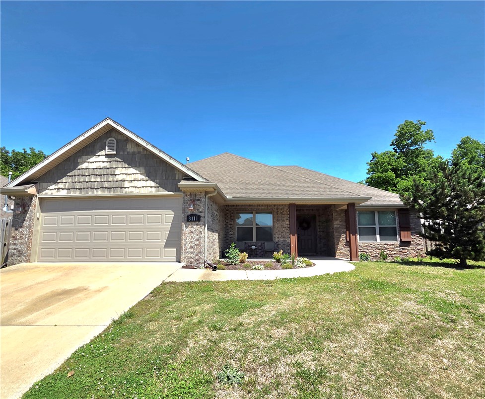 Fresh, clean, and ready for move-in—this home in Rogers offers a comfortable layout with thoughtful updates throughout. Recently painted with durable flooring (no carpet), it’s designed for easy living and low maintenance. The kitchen features quartz countertops and updated appliances, opening nicely into the main living space for a natural flow that works for both everyday life and hosting.

Step outside to a fully fenced backyard, perfect for relaxing, with a storage shed for added convenience. Located in the established Rollers Ridge neighborhood, you’ll enjoy a great Rogers location close to shopping, dining, and everyday essentials.