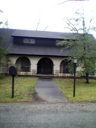 Majestic historic Mediterranean style 2 story plus above ground basement. Quiet neighborhood towards the lake 2 mi from downtown Rogers. Needs some updates but offers offers incredible buy for the ask. New roof in 2012. Sprawling old world charm w built in screened deck spanning the entire 2nd floor overlooking the fenced backyard. Chandelier dining, Fresco dining on the deck, late night  fireplace adds to the mystery and the Romancing Charm at heart in this home. Text/ Call Carlette to show 381-3144