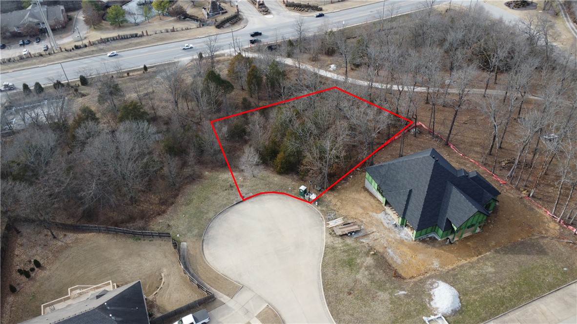 Large East Fayetteville lot is the perfect spot to build your dream home! Watch the sunrise in the east from your front porch, and enjoy the sunset from your back porch! Located in a quiet cul-de-sac on a beautiful wooded lot. Just minutes from the U of A, Dickson St, and all of Fayetteville's best restaurants!