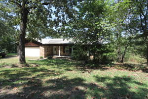 Huge deck all along the back of the house, where you can enjoy amazing views of Big Piney and the cliffs! From the front, enjoy views of the neighbors beautiful pasture land. Very private home on 4 acres. Home features both upper and lower living areas. Large home with 6 bedrooms, 3 full baths,  metal roof, and tons of potential! NEW heat and air system in July 2020