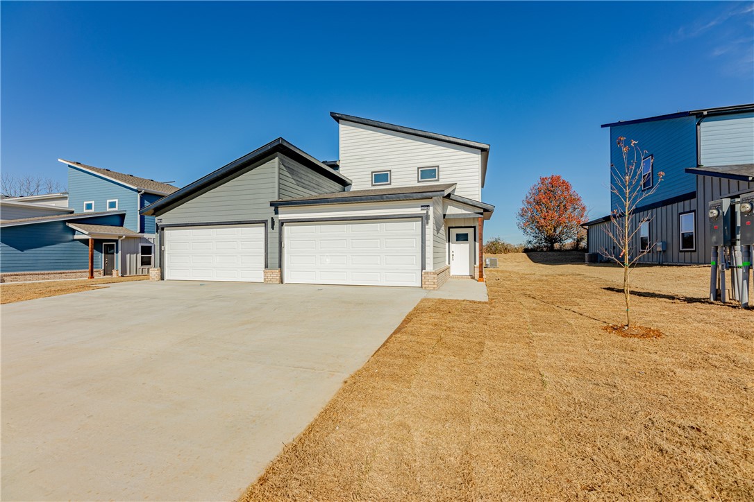 Unique and modern best describe these 3 bed 2.5 bath Brand New Construction Duplexes in SW Bentonville. Lots of amenities that include granite counter tops, luxury vinyl Plank flooring throughout, 2" faux wood blinds, upstairs study nook, ALL appliances, private covered back patio and more. Walking distance to Bentonville's newest Creekside Park, a 35-acre community park, with regulation cricket field, pickleball courts, evening-lit dog park, splash pad, playground and passive recreation space with a group pavilion. Close to everything Bentonville has to offer.