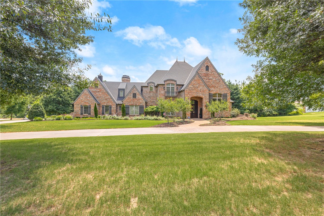 Impeccable Talamore Estate Home on 2.02 Ac w/5 Car Garage & Saltwater Pool. Your 6,479 SF Home feat. new paint throughout, hand scraped wood floors & custom upgrades. Grand entry welcomes you w/beautiful formal dining space to left & formal sitting room ahead. The living area is spacious and open w/beautiful views to your private oasis outside. Kitchen boasts 6 burner gas stove w/double oven, SubZero Fridge, built in espresso maker, wine fridge & much more! Living room has vaulted ceilings w/wood beams and beautiful stone fireplace. Main level has guest bed w/ensuite. Primary suite is spacious w/spa worthy bath feat. Tub, walk through shower, separate vanities & custom WIC. Upstairs is the study w/built ins & fireplace. 2 guest beds each w/ensuite & WIC. Billiards room, Home Theatre w/Wet bar & bonus room. Heated 4 Garage w/climate-controlled storage room. 5th Garage home gym w/access to pool & half bath. Private wooded setting for your expansive pool & patio. Contact agent for full list of upgrades & floorplan.