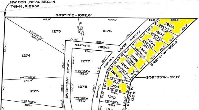 Total of 8 lots consisting of approx. 1.96 acres m/l being sold as one package. City water available. With a little clearing could have a little lake view.