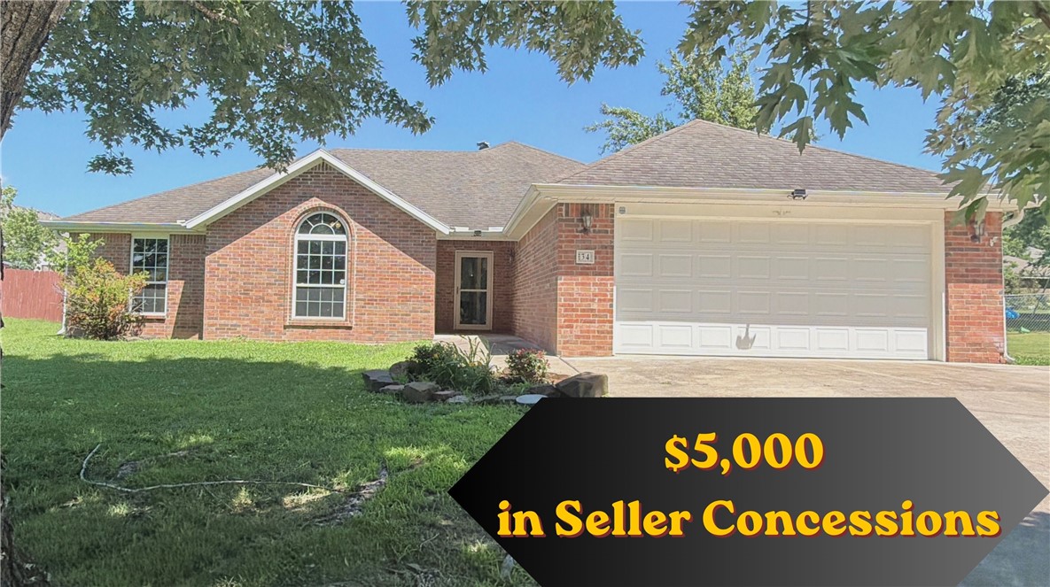 Welcome to the Gateway of NWA! Seller is offering $5,000 in Seller Concessions!  This inviting 3-bedroom, 2-bathroom home offers 2,060 square feet of comfortable living space, perfectly situated within the Greenland city limits. Enjoy the unique benefit of Fayetteville utilities combined with an unbeatable location, just a short 2 minute drive to the interstate and 10 minute drive to University of Arkansas. Commuting is a breeze, with quick and easy access to both the University of Arkansas and vibrant downtown Fayetteville. A standout feature of this property is the massive 4-car garage, providing exceptional storage, workshop space, or room for all your vehicles and outdoor gear.
